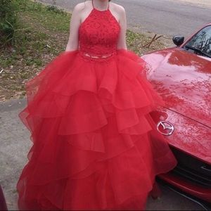 Size 4 red prom dress. It is Ellie Wilde